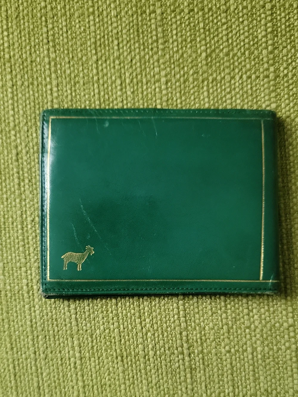 Green Leather Bifold Wallet with Gold Goat Accent